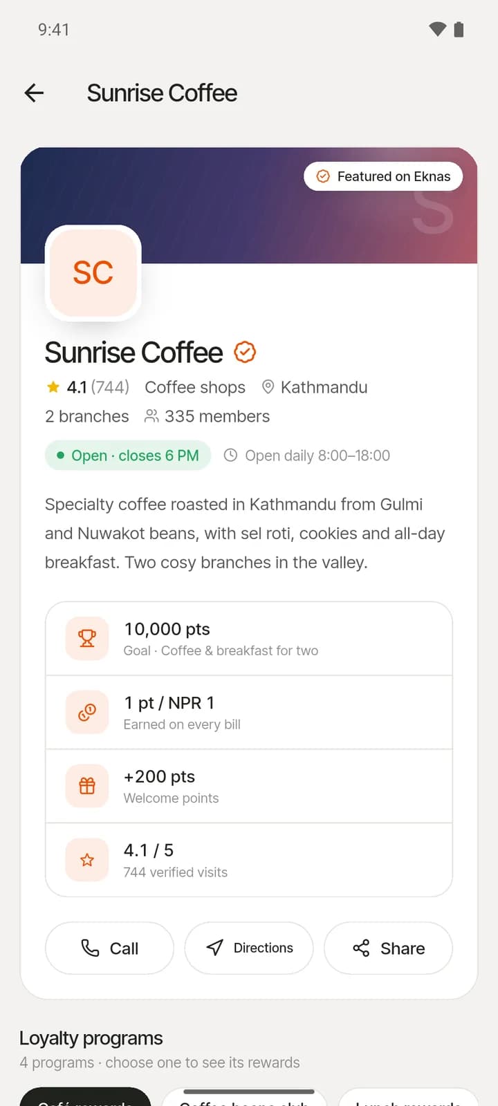 A shop's public Eknas page on a phone, with its loyalty card, rewards, opening hours and reviews