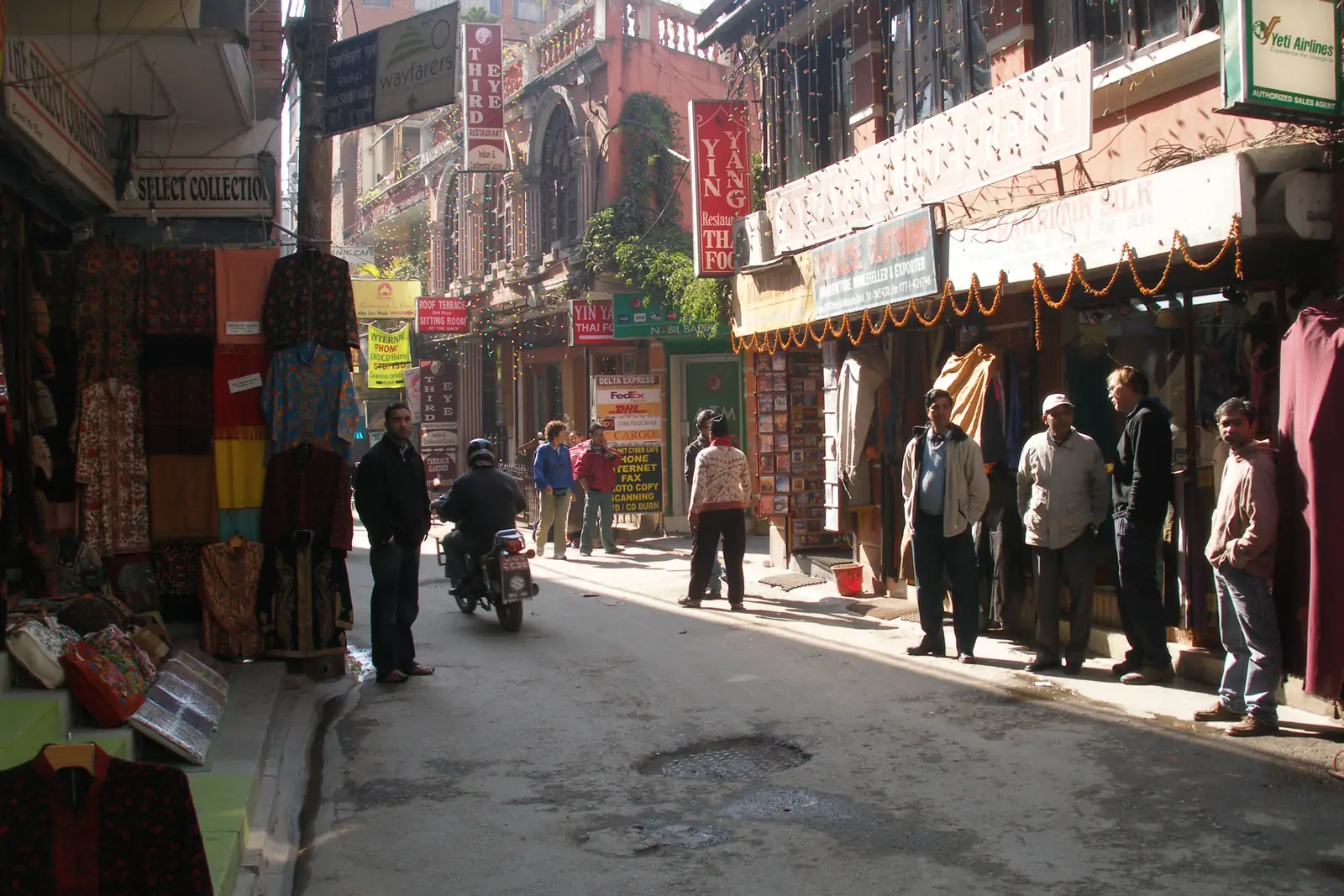 A street of small shops and signboards in Thamel, Kathmandu